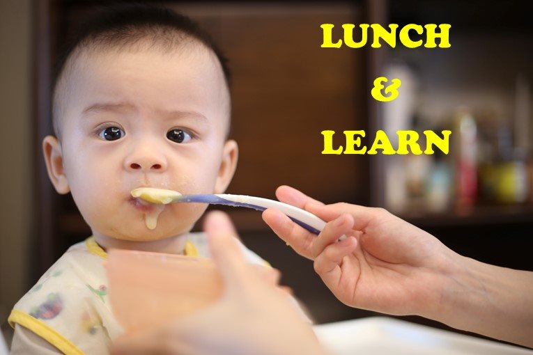 Mother feeding baby and lunch and learn